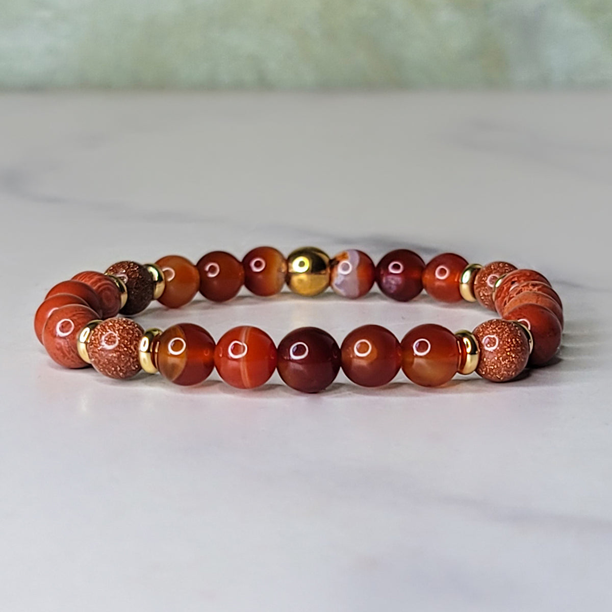 Invincible Wrist Wear | Carnelian, Red Jasper, Goldstone